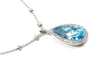 Diamond and Swiss Blue Topaz Nacklace in 14KW